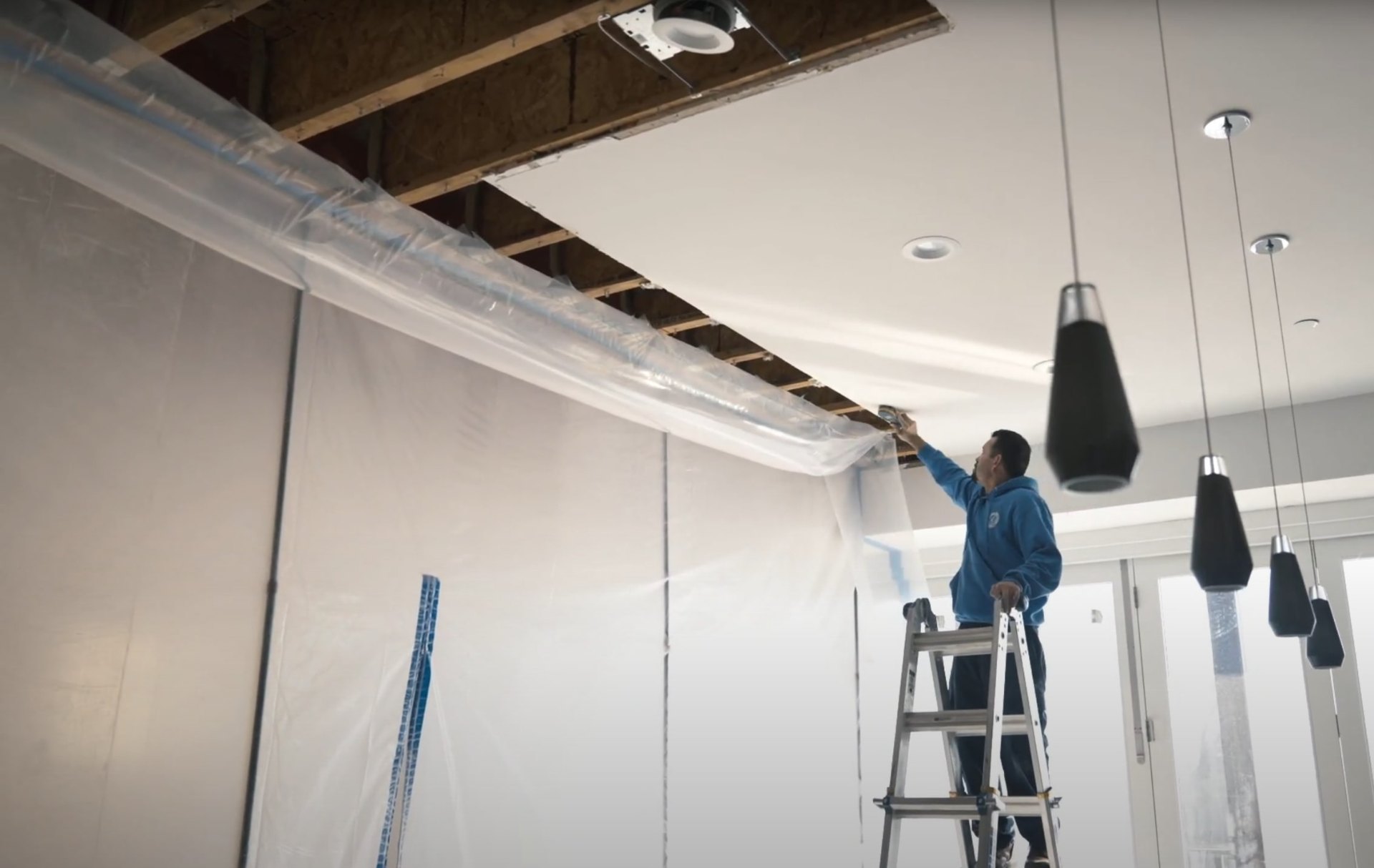 Water damage restoration equipment and protective barriers during restoration process
